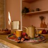 La meseta de java vent de bohème En una mesa con los higos