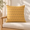 HINDI yellow square scatter cushion 50 x 50 cm on an armchair