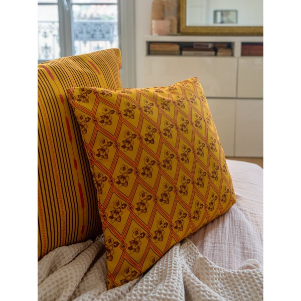HINDI yellow square cushion cover 40 x 40 cm, filled, on a sofa with another cushion from the collection, close-up