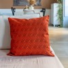 HINDI orange square cushion cover 40 x 40 cm, filled, on a sofa