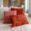 HINDI pink square scatter cushion 40 x 40 cm on a sofa with other cushions from the collection