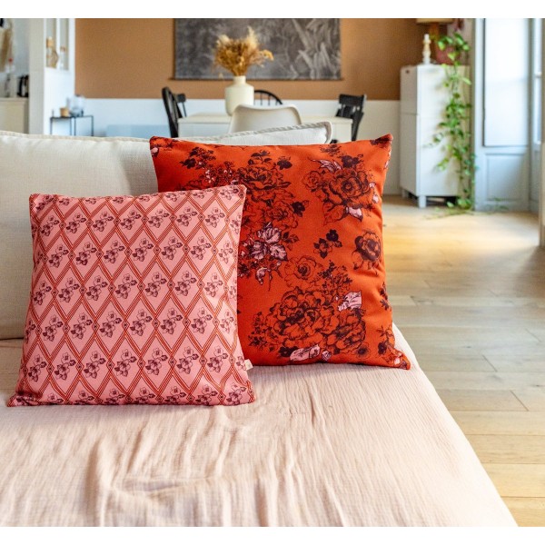 HINDI pink square scatter cushion 40 x 40 cm on a sofa with another cushion from the collection