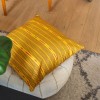 PALOMA yellow square scatter cushion 40 x 40 cm on a pouffe